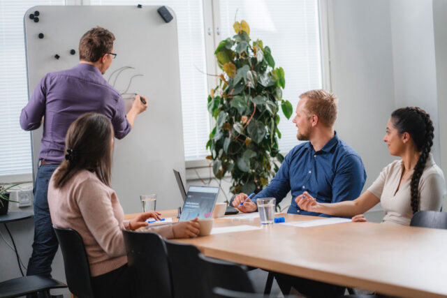 Uniogen team in a meeting